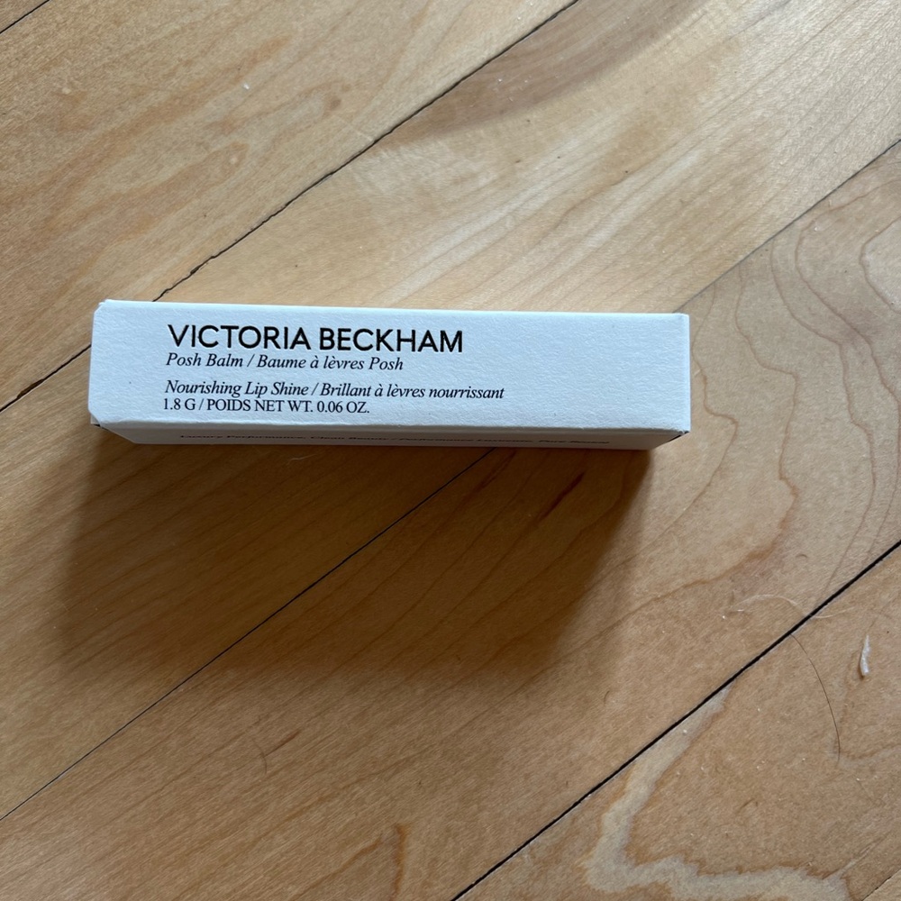 Victoria Beckham Posh Balm in shade Fleur which is a natural flushed pink